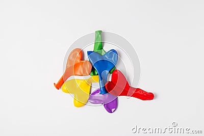 Rainbow balloon hearts for decoration in LGBT colors. Set of isolated heart shaped deflated balloons for greeting card for Pride Stock Photo