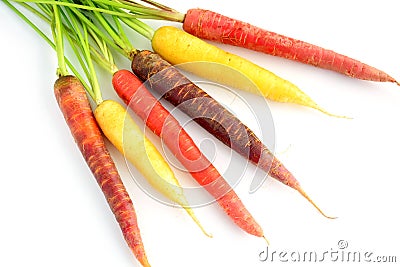 Rainbow carrots on white background Stock Photo