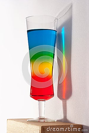 Rainbow coctail with reflection Stock Photo