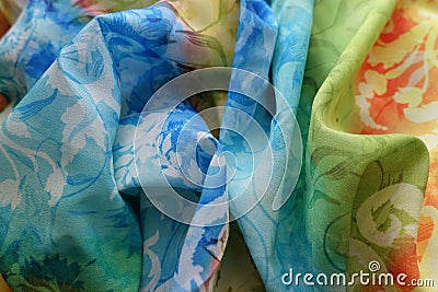 Rainbow colored bright folded chiffon fabric Stock Photo