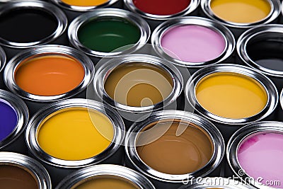 Rainbow colors, Group of tin metal cans Stock Photo