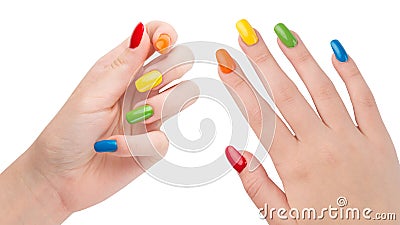 Rainbow colors manicure. Colorful nails. Woman hands after nail salon. Glossy nail polish. Gel or acrylic fake or false nails. Art Stock Photo