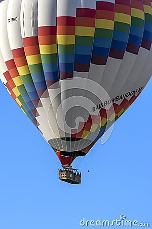 A rainbow coloured hot air balloon. Editorial Stock Photo