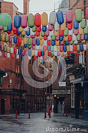 Rainbow coloured lanterns on an empty street in Chinatown, London, UK Editorial Stock Photo