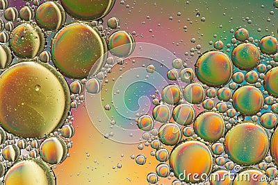 Rainbow effect, gold and green psychedelic background Stock Photo