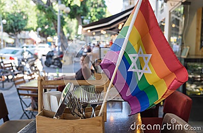 Rainbow flags with the jewish star of David at undefined cafe Stock Photo