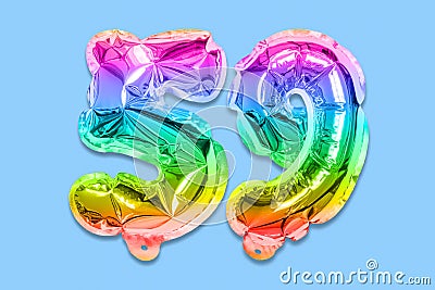 Rainbow foil balloon number, digit fifty nine on a blue background. Birthday greeting card with inscription 59 Stock Photo