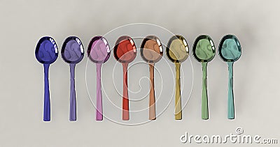 Rainbow glossy color metal spoons arranged in line Stock Photo