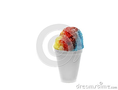 Rainbow Hawaiian Shave ice, Shaved ice or snow cone in a plain white cup against a white background. Stock Photo