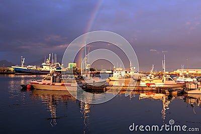 Rainbow in Hofn port, Iceland Stock Photo