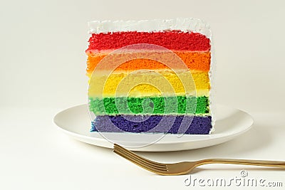 Rainbow layered cake slice Stock Photo