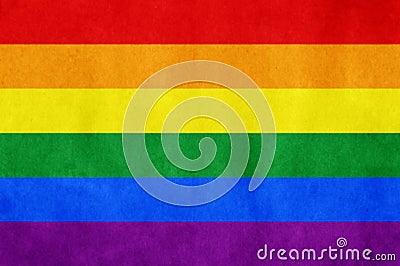 Rainbow LGBT gay flag on old paper background Stock Photo