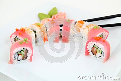 Rainbow Maki Sushi with Eel, Tuna, Salmon and Avocado Stock Photo