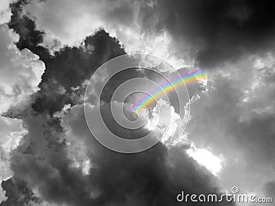 rainbow middle heap gray cloud black white color Stock Photo