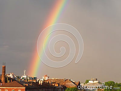 Rainbow multi color image in blue sky rain nature Stock Photo