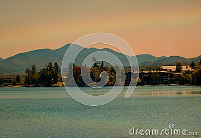 Rainbow over lake placid Stock Photo