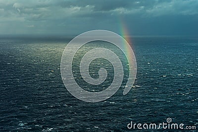 Rainbow over the sea Stock Photo