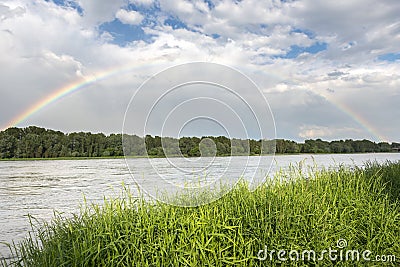 Rainbow over Vistula river in Warsaw Stock Photo