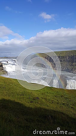 Rainbow over a Waterfall Foss in Iceland Stock Photo