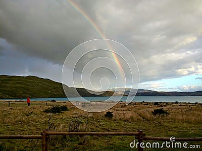 Rainbow at Paine Grande camping site Stock Photo