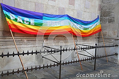 Rainbow peace flag during a demonstration of Italian pacifists b Stock Photo
