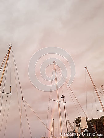 Rainbow playing with the sailboats Stock Photo