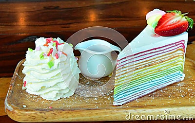 Rainbow Strawberry crape Cake on the Table Stock Photo