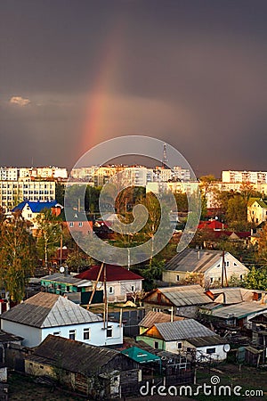 Rainbow sunny day dreamtime houses window Stock Photo