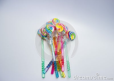 Rainbow Swirl Ripple Lollipops. Stock Photo