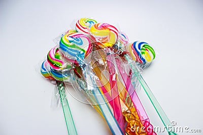 Rainbow Swirl Ripple Lollipops. Stock Photo