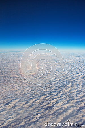 Rainbow from the top, view from the airplane Stock Photo