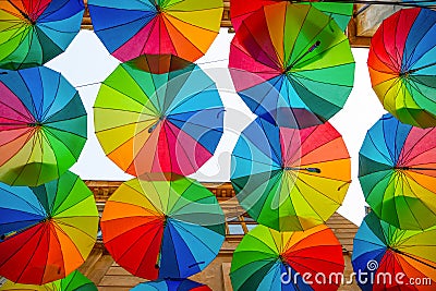 Rainbow umbrellas roof street in Victory Passage , Bucharest Editorial Stock Photo