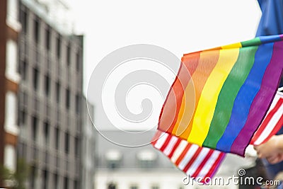 Rainbow and United States of America flags and as symbol of LGBT movement in USA. Event for the protection of human rights and Stock Photo