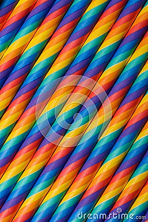 Rainbow vibrant multicolored striped paper straws Stock Photo