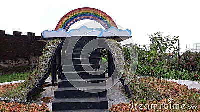 Rainbow and white cloud replication in the park Stock Photo