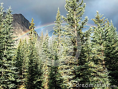 Rainbows over mountains Stock Photo