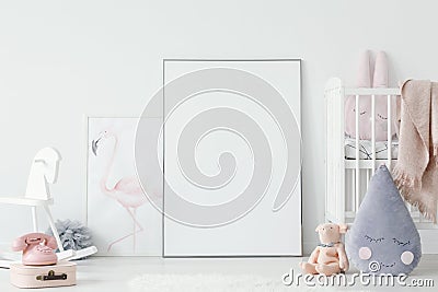 Raindrop pillow and toys in child`s bedroom interior with cradle Stock Photo