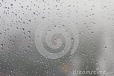 Raindrop, water drops on a glass surface of window Stock Photo