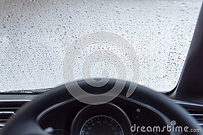 Raindrop water on front Windshield car in rainy season Stock Photo