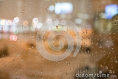 Raindrops on a airport windo Stock Photo