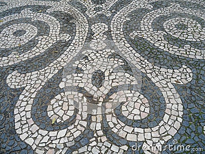 Raindrops on the Cobblestone Street, Portuguese Pavement in Evora Stock Photo