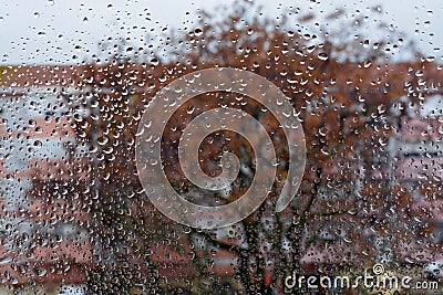 Raindrops on the glass. Window in March. Season specific. Portugal. Almada. Early spring. Stock Photo