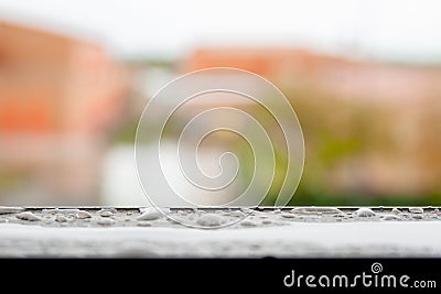 Raindrops on home surfaces during a rainy day Stock Photo