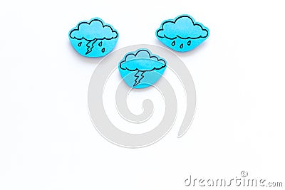 Rainfall forecast concept. Weather icons. Rainy cloud, lightening on white background top view copy space Stock Photo