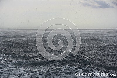 Rainfall on sea Stock Photo