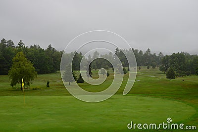 Raining on the golf course Stock Photo