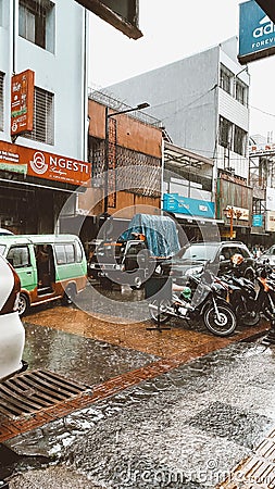 rainy city with lots of public transportation Editorial Stock Photo
