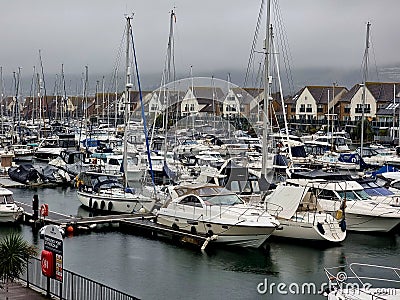 Rainy day at Port Solent in the docks with all the yachts and grey skies above Portsmouth, UK Editorial Stock Photo