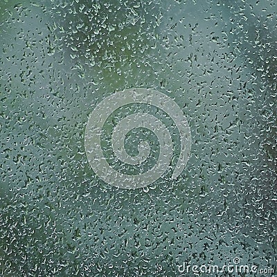 Rainy day, raindrops on wet window glass, vertical bright abstract rain water background pattern detail, macro closeup, detailed Stock Photo