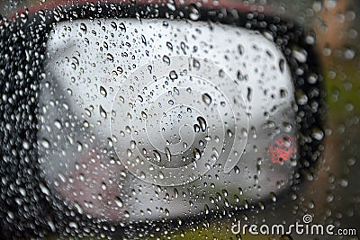 Rainy days, Rain drops on a car window Stock Photo